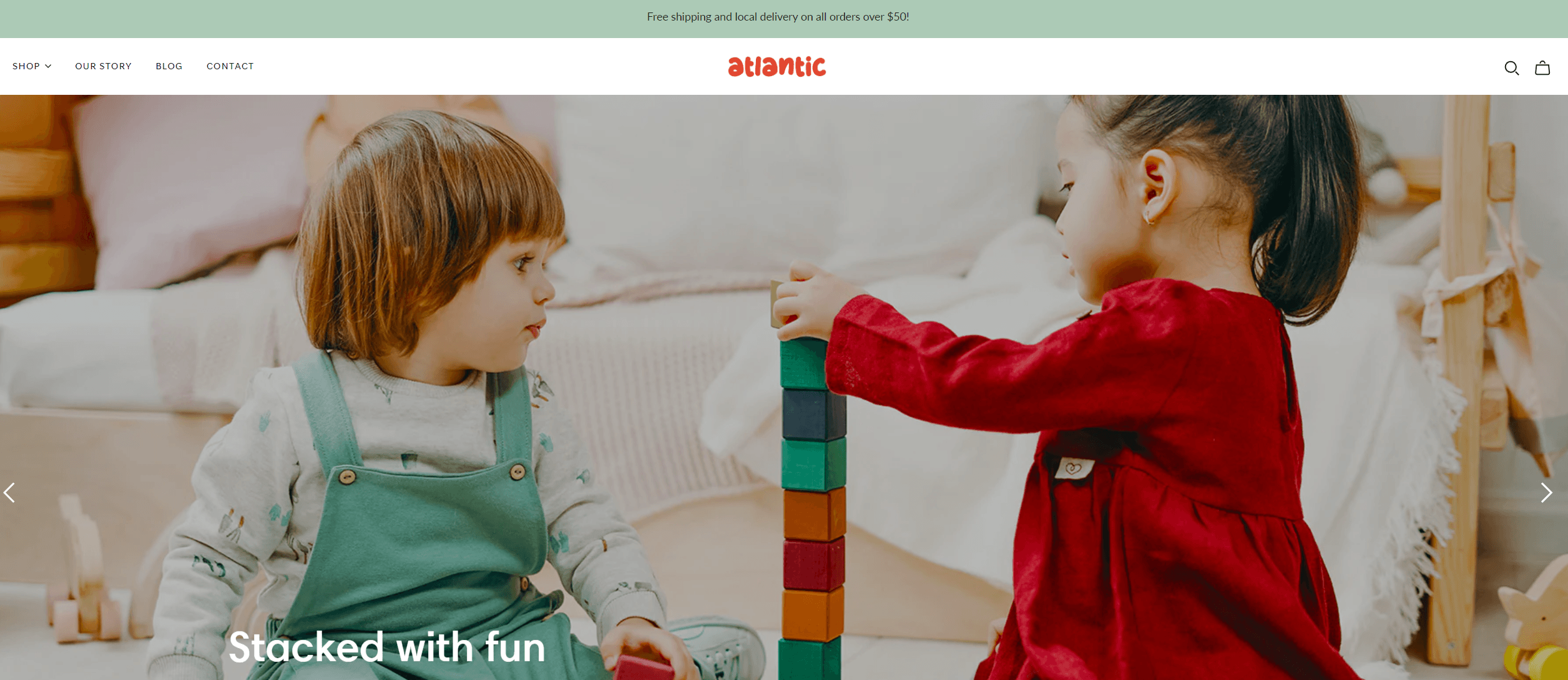 A child and child playing with blocks  Description automatically generated